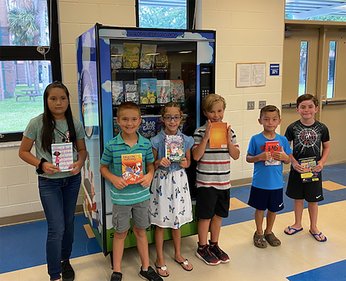 Some of South Elementary School's top readers were invited to select new books from the book vending machine on June 16.